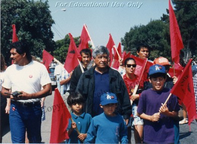 César E. Chávez marching with supporters