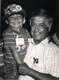 Cesar Chavez with a young child